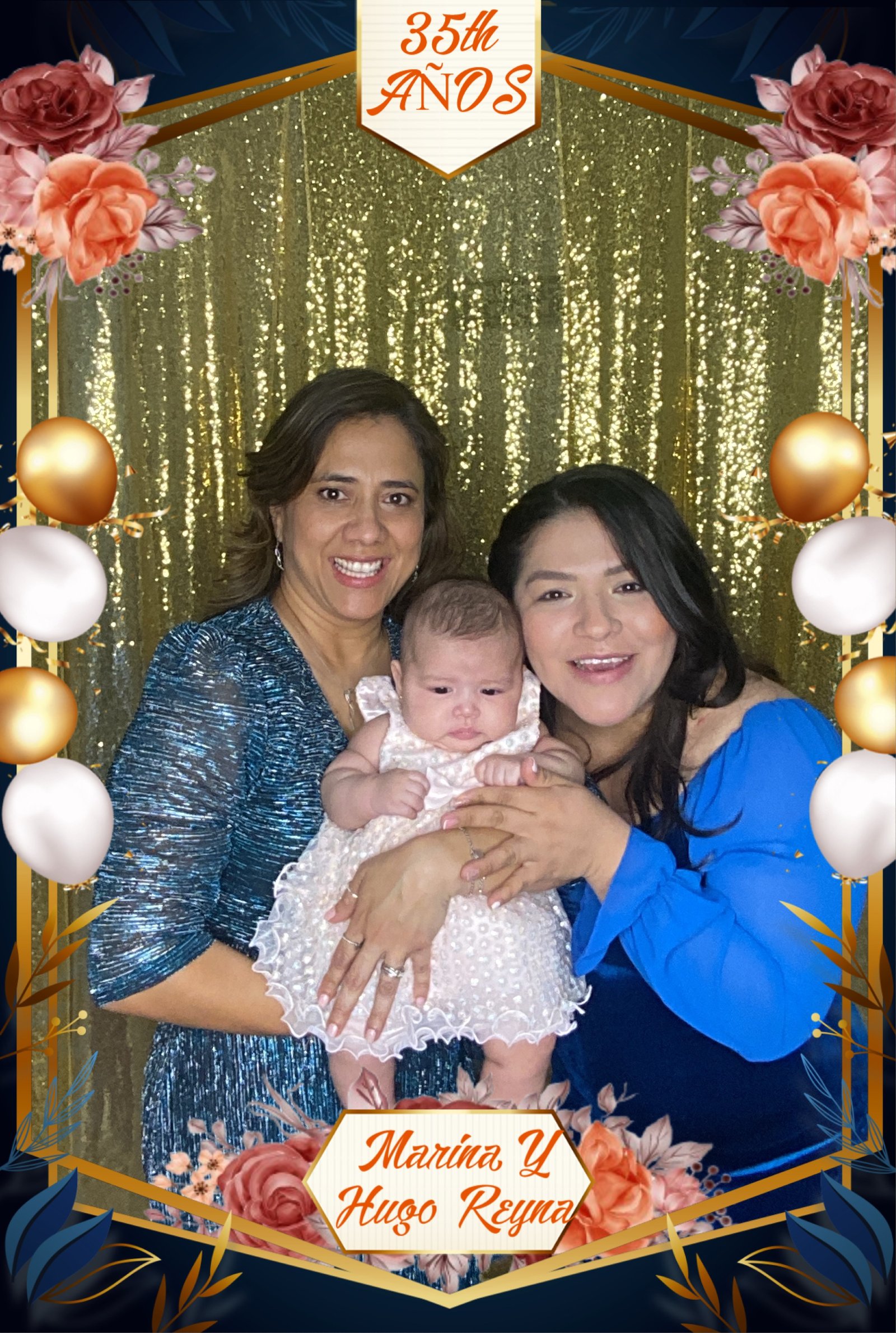 Group posing in digital photo booth at anniversary party